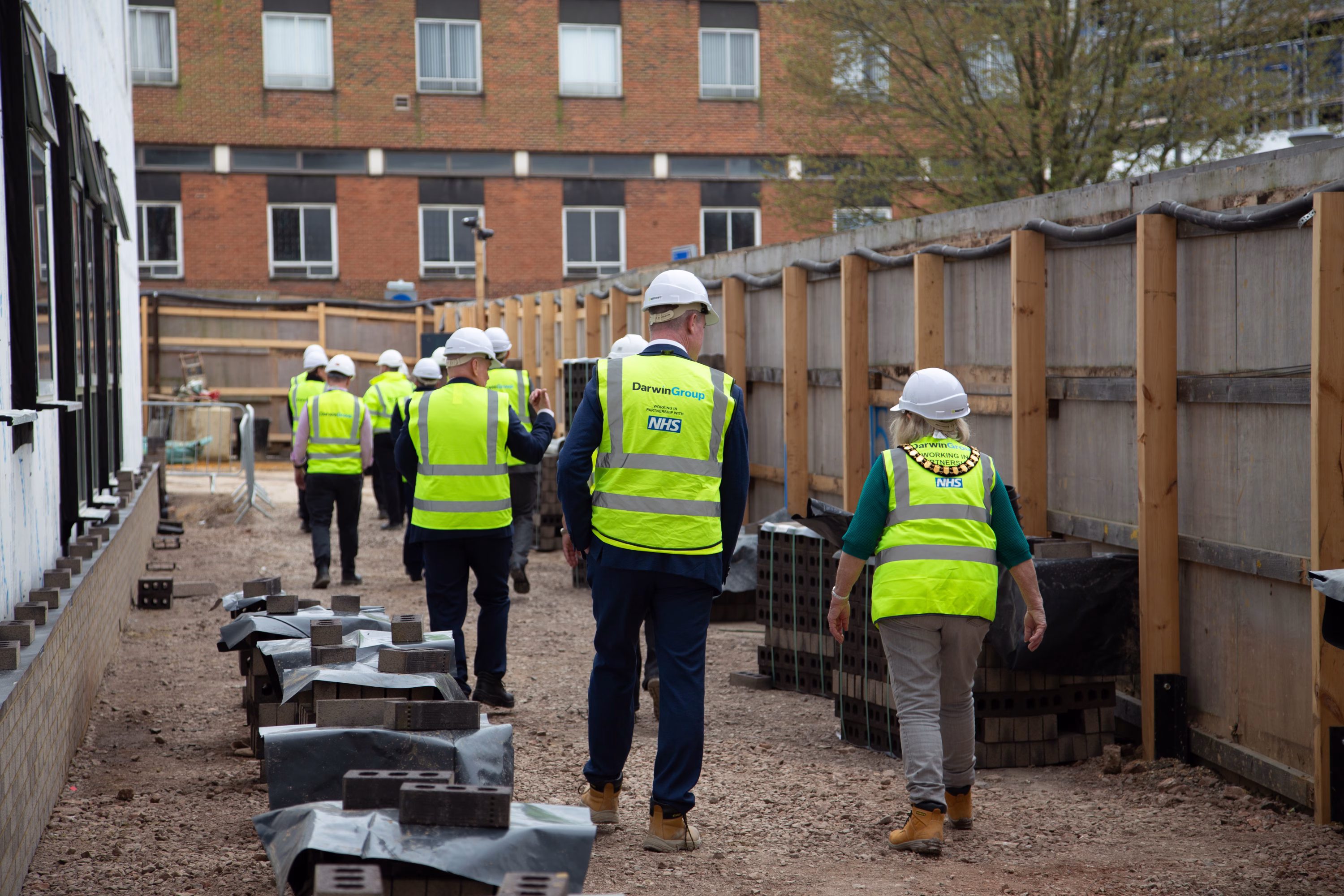Visitors from the site looking around the outside of the building