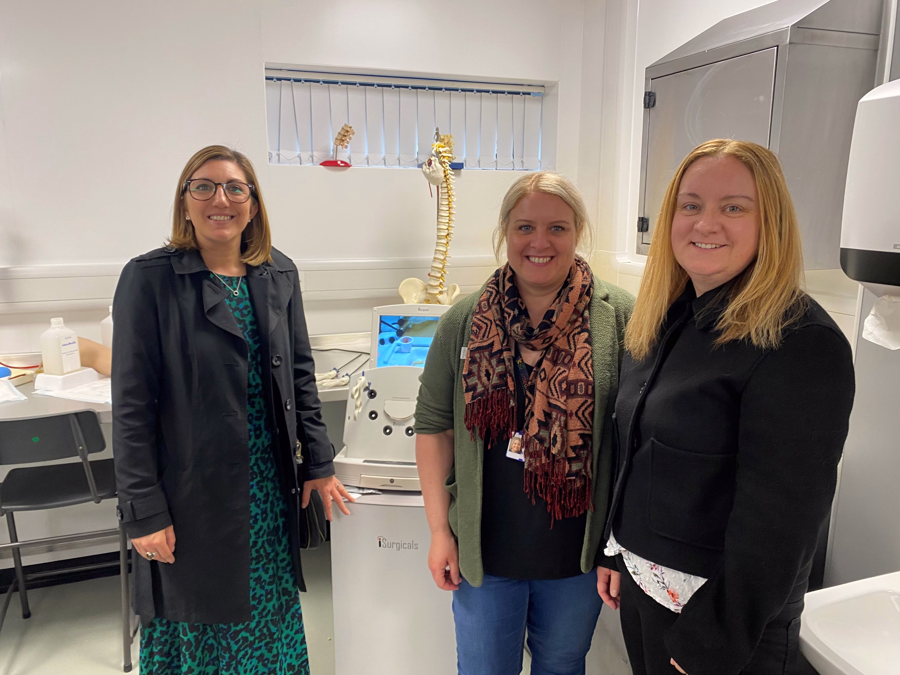 Calderdale Learning Centre opening ceremony - three smiling women standing in a side room of the new Learning Centre