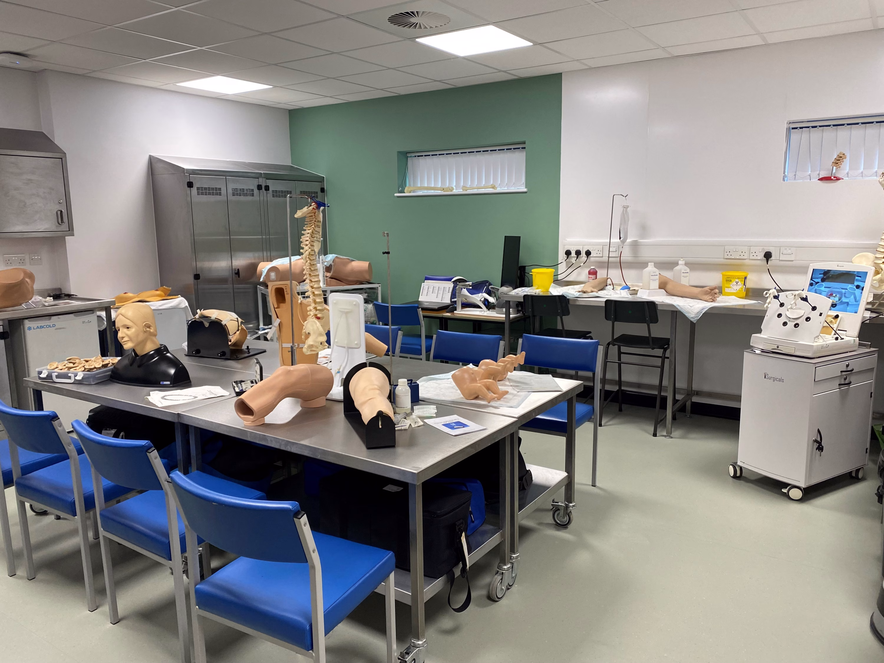 Calderdale Learning Centre opening ceremony - class room with a number of tables full of medical props and training devices